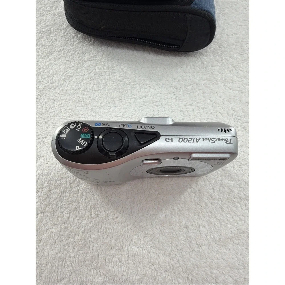 Canon PowerShot A1200 12.1MP Digital Camera - Silver - (For Parts/Repair) & Case